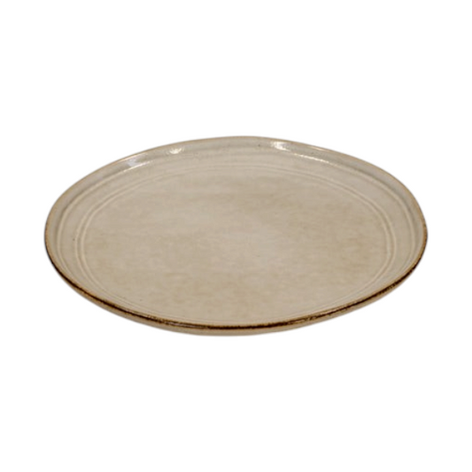 Four Candle Satchville stoneware side plate in a neutral beige glaze with a rustic, textured rim on a white surface.